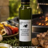 Rosemary Garlic Infused Olive Oil product photo by a picket fence